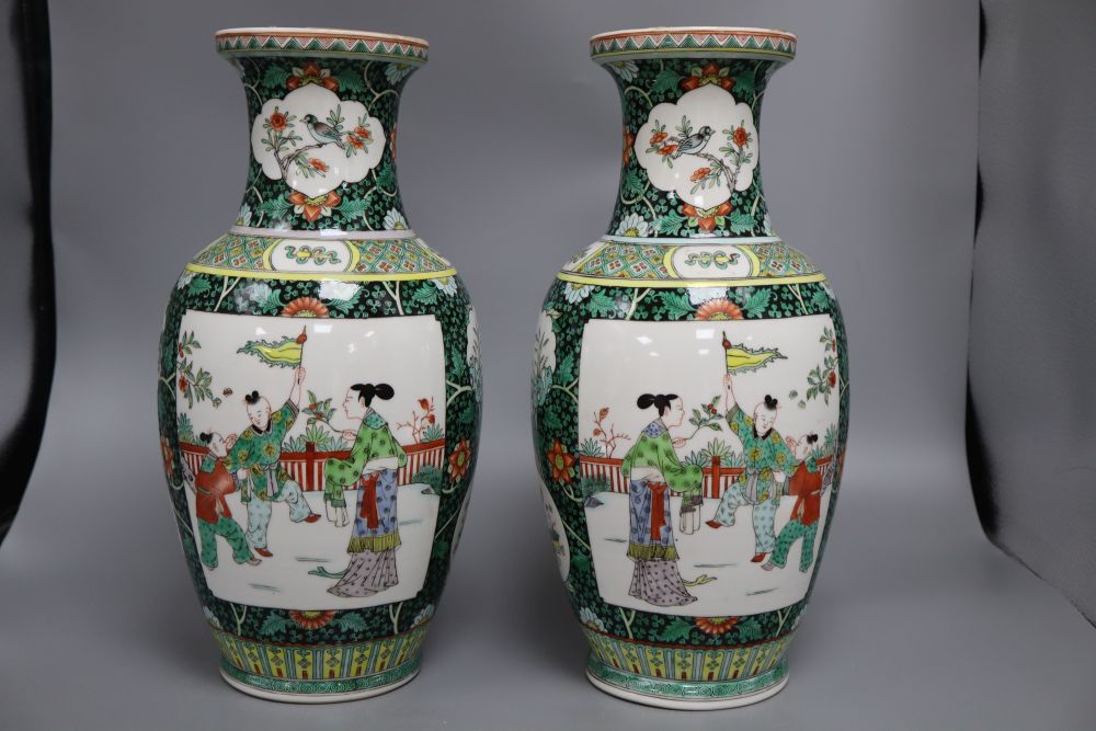 A pair of Chinese famille verte vases, height 36cm